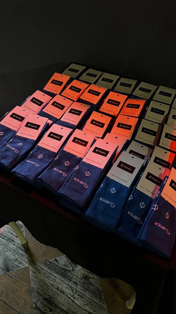 Fluence branded socks prepared as an event giveaway